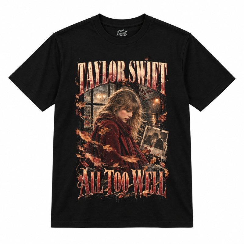 Camiseta preta Taylor Swift All Too Well com a Taylor Swift de casaco e cachecol vermelhos
